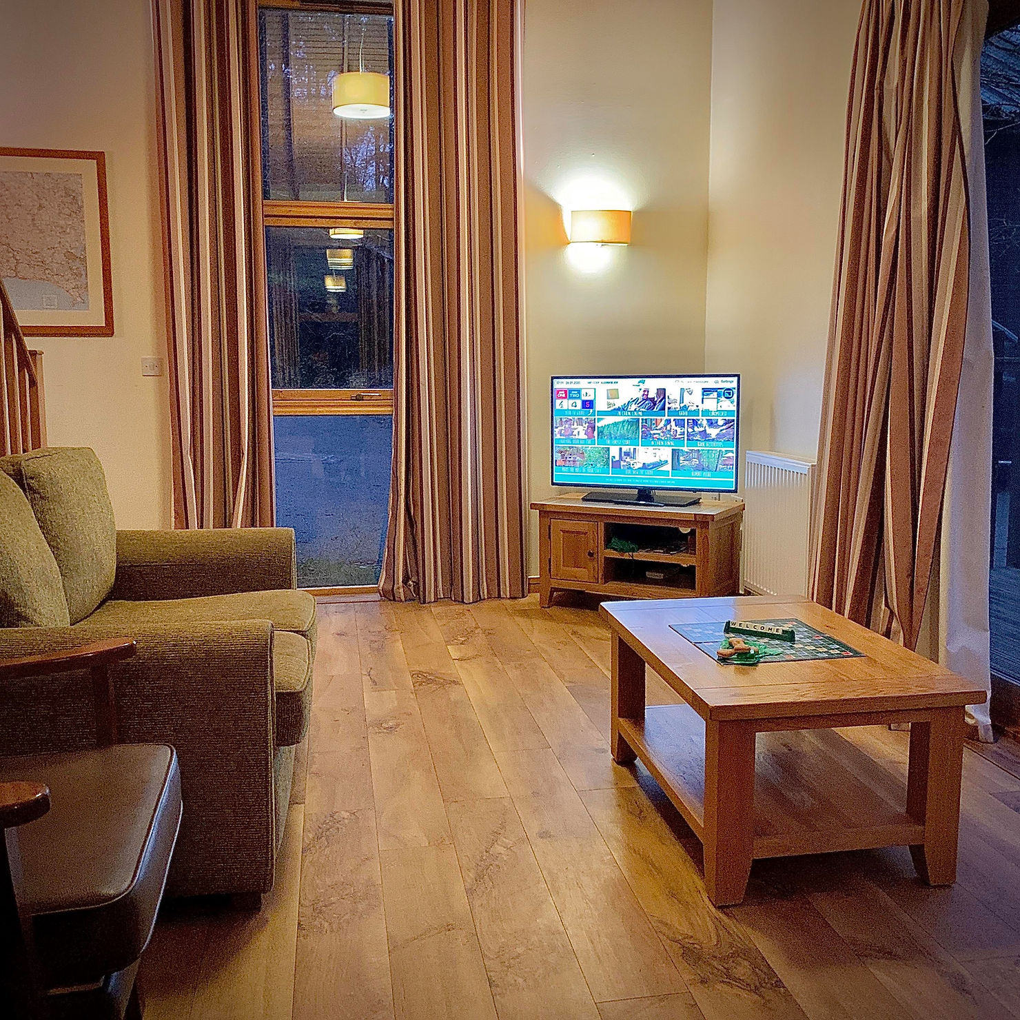 Lounge area - showing sofas and TV