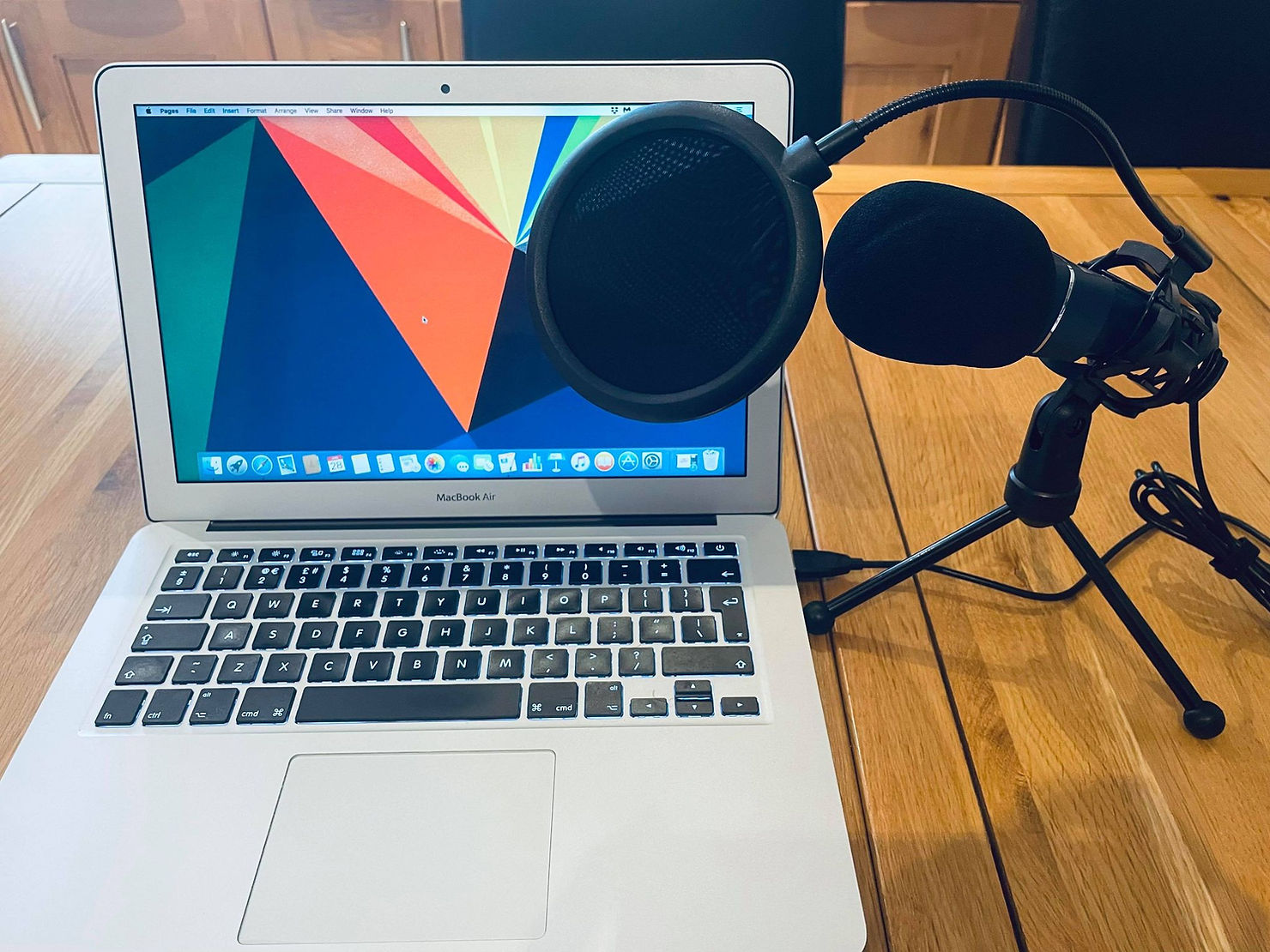Ross's laptop setup beside a microphone